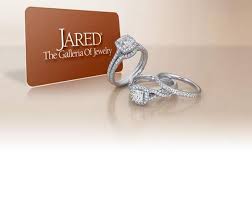 Three diamond rings of Jared Jewelry with the company name beside.