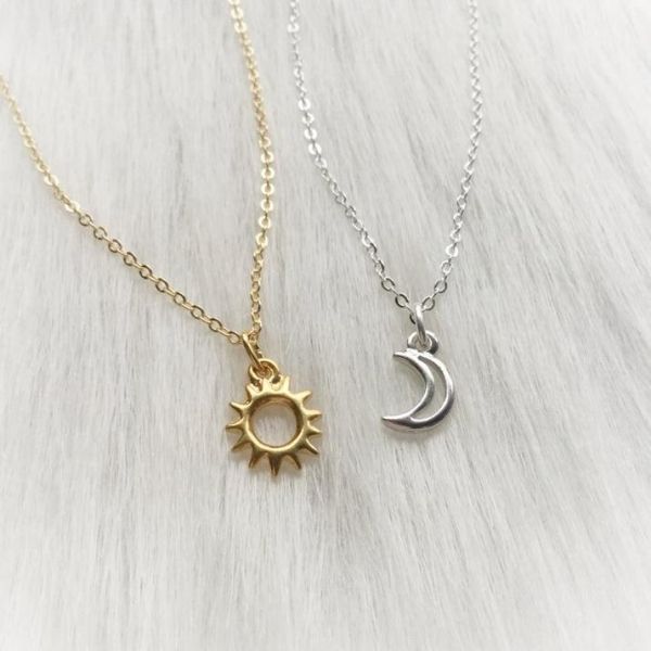 Gold sun and silver moon pendant with chained lace