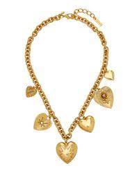Charm necklace with six distinct heart charms, inspired by a different Victorian-era locket.