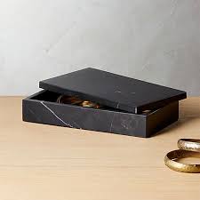 CB2 Large Black Marble Box on the table