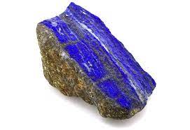 One of the large lapis lazuli that is still connected to its host rock