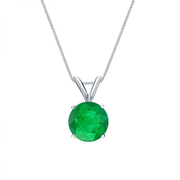 A large round emerald pendant is attached to silver lace on a white background