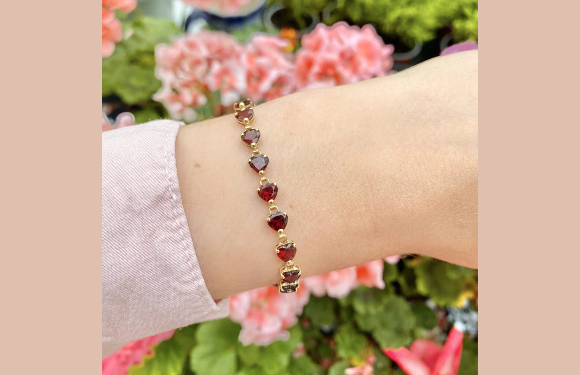 The bracelet is made up of heart-shaped Garnets placed in individual 9ct yellow gold settings