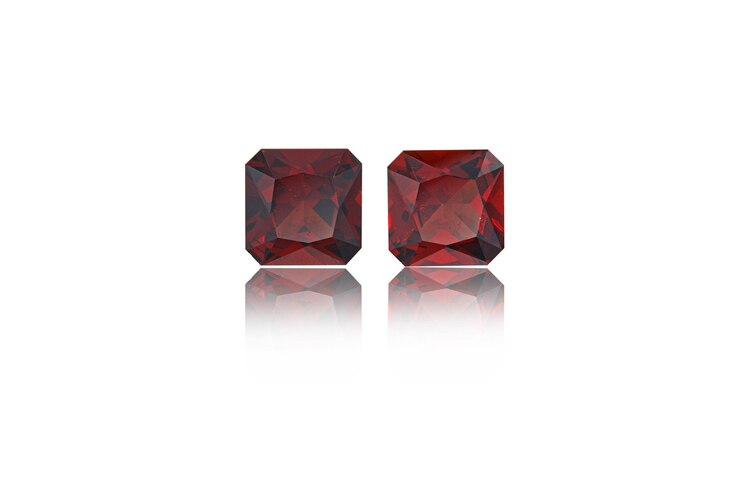 Two red color gemstones