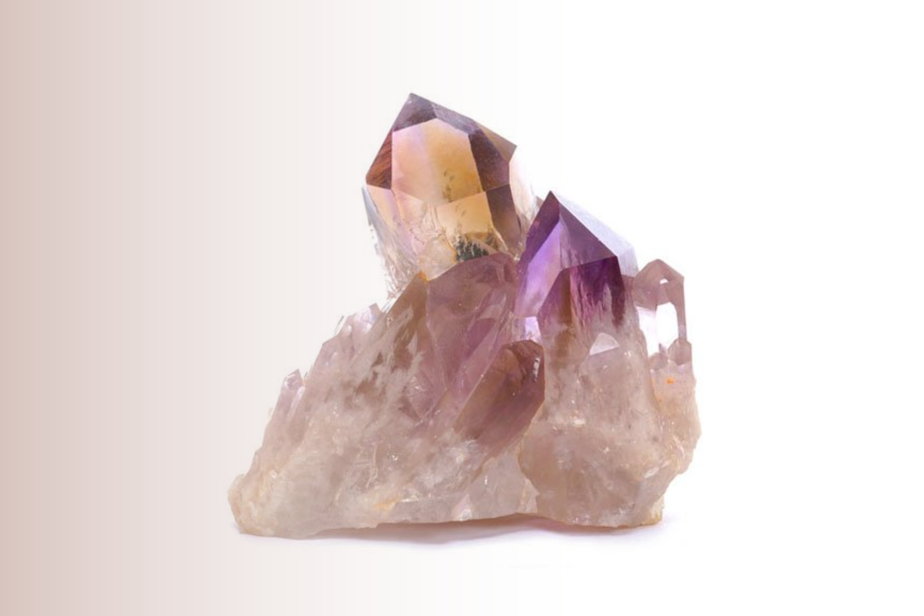 Ametrine crystal that is still connected to its host rock