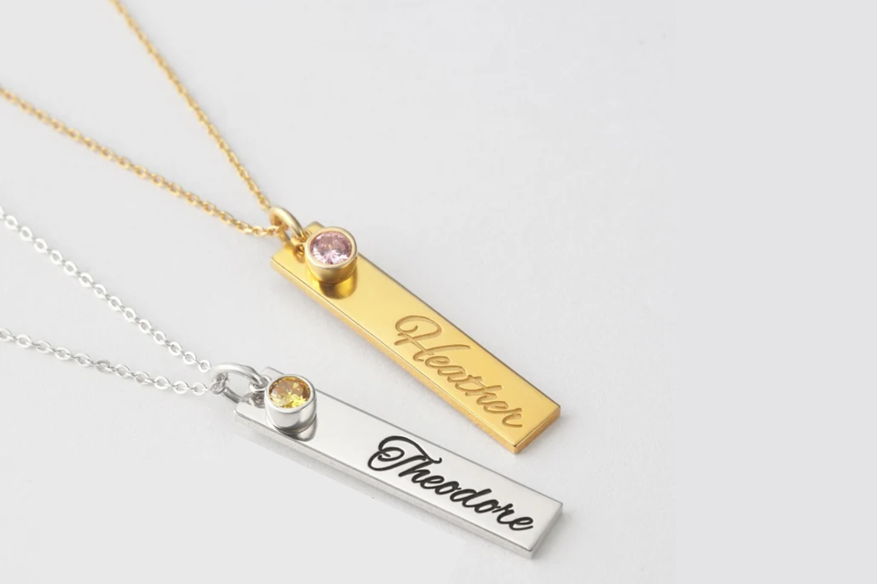 Long gold and silver pendant with engraved grandchild's name
