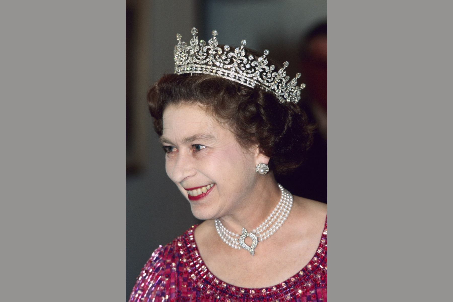 Queen Elizabeth II wearing the Japanese pearl choker and a crown
