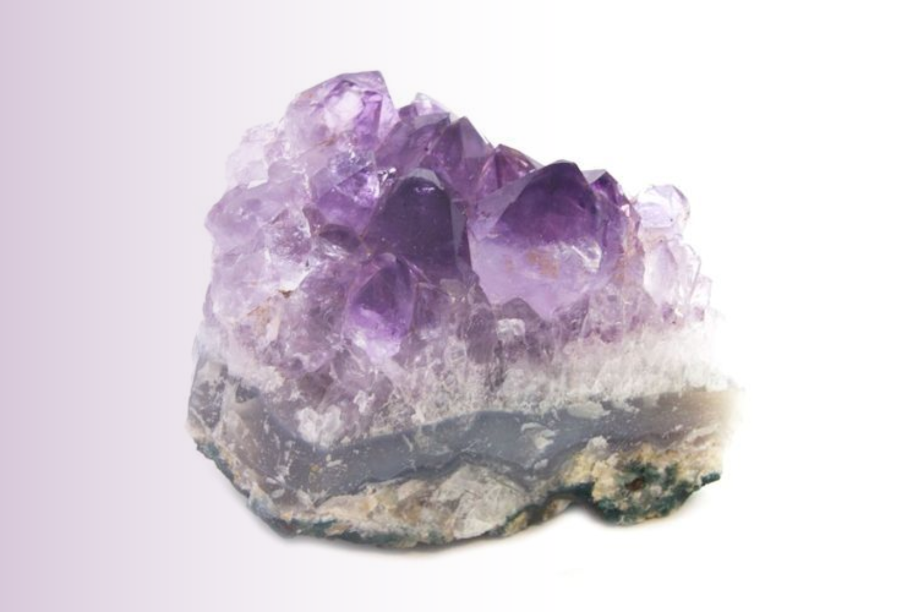 Amethyst crystal that is still connected to its host rock