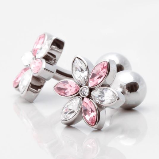 A pair ofpPink and clear crystal floral cufflinks with a spherical shape at the end.