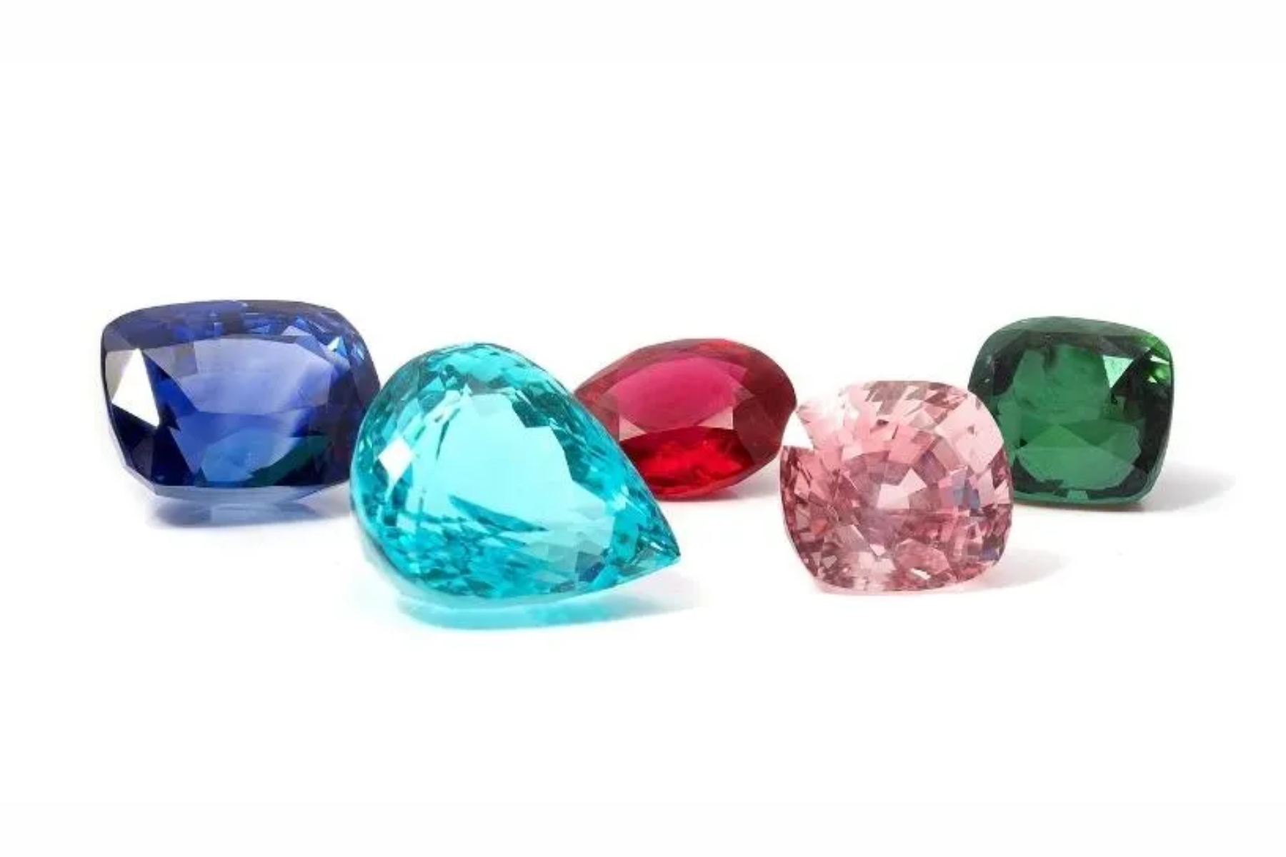 Five different types, shapes, colors of birthstones