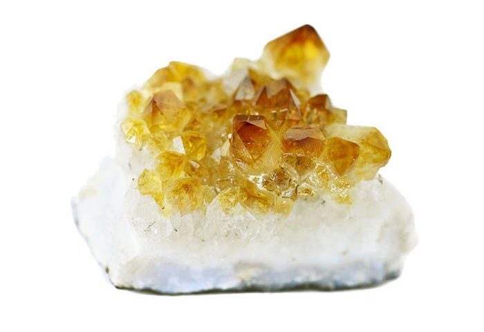Citrine stone still attached to its host rock
