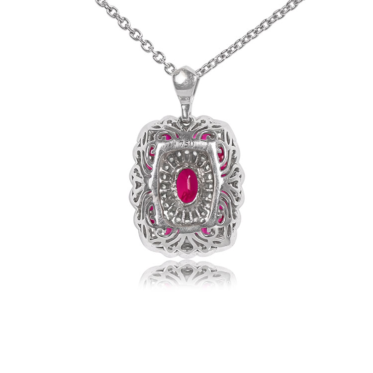 Gravois pendant has a white gold elements that covers the ruby gem and also supported by a 18k white gold chain