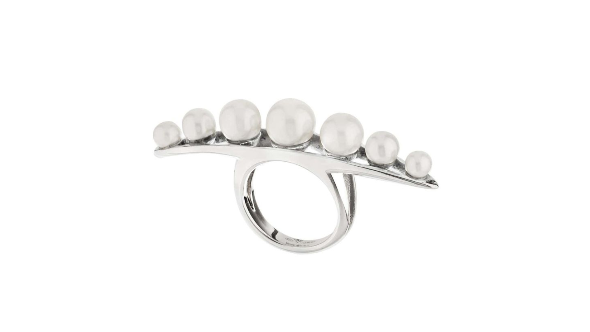 A silver Massage Ring with pearls