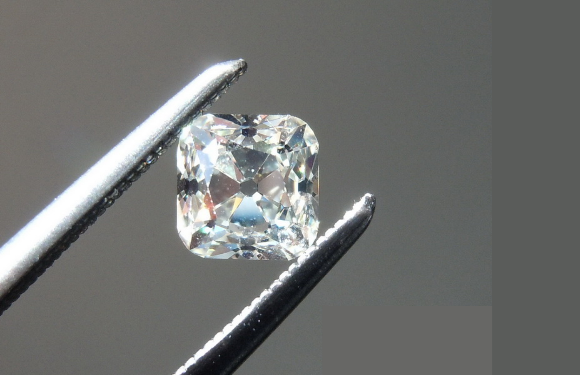 Peruzzi cut diamond on a prong