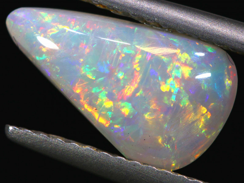 Rounde edged triangular white opal on forceps