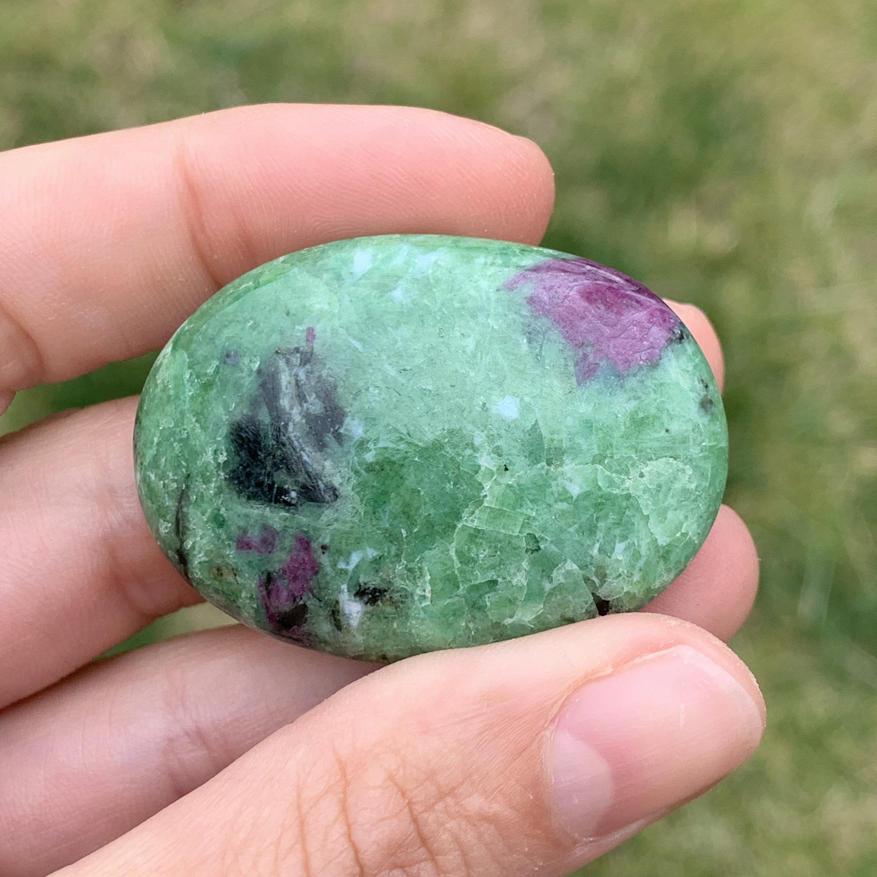 Zoisite stone on a hand