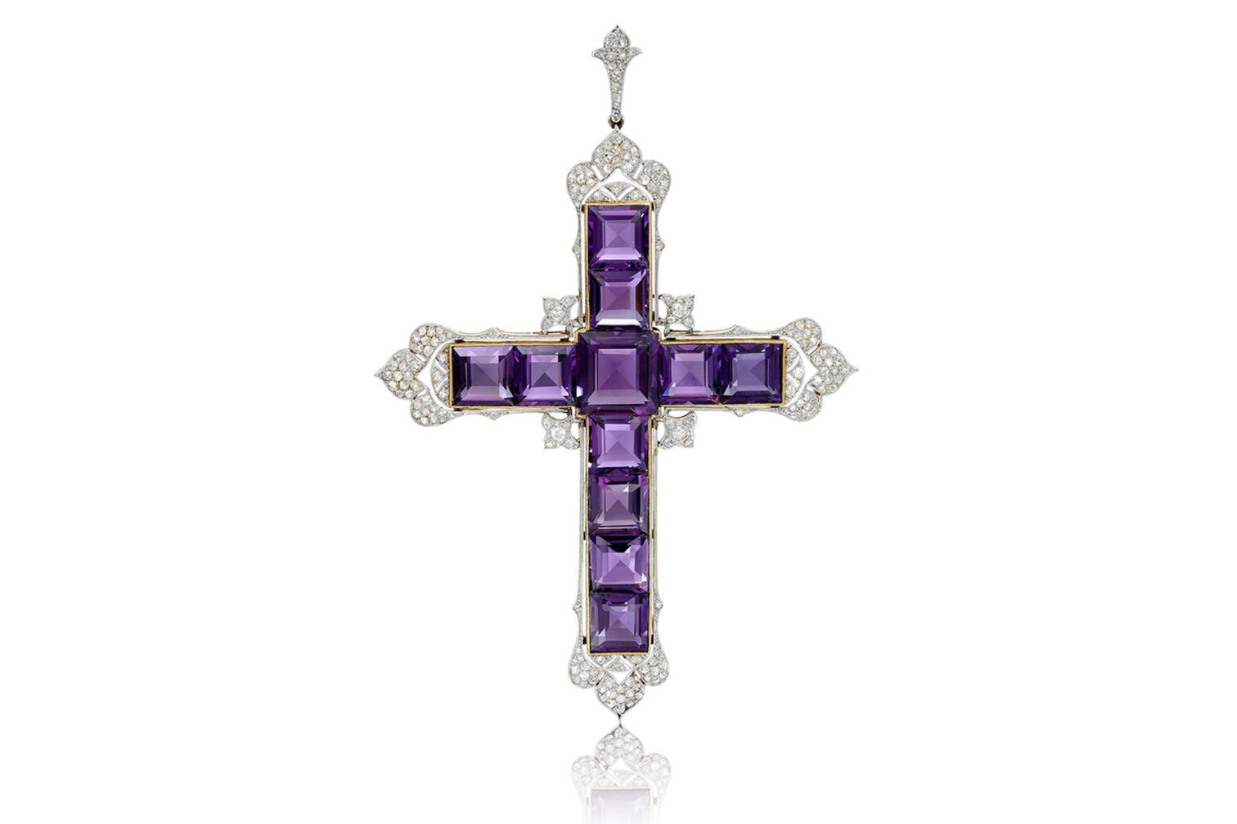 136 mm wide by 95 mm tall cross pendant with 5.25 diamond carats and 11 amethysts