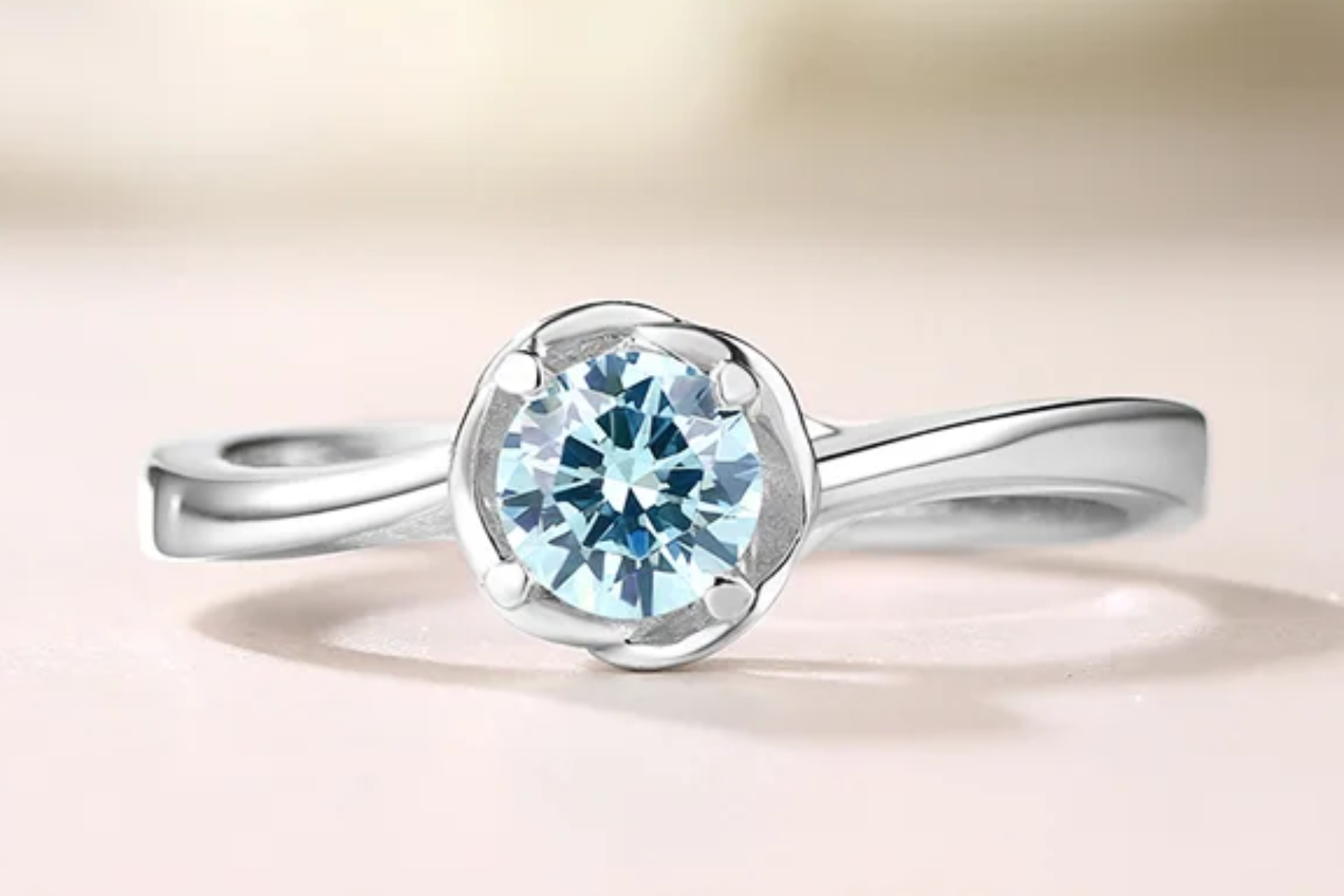 Solitaire birthstone ring with blue stone