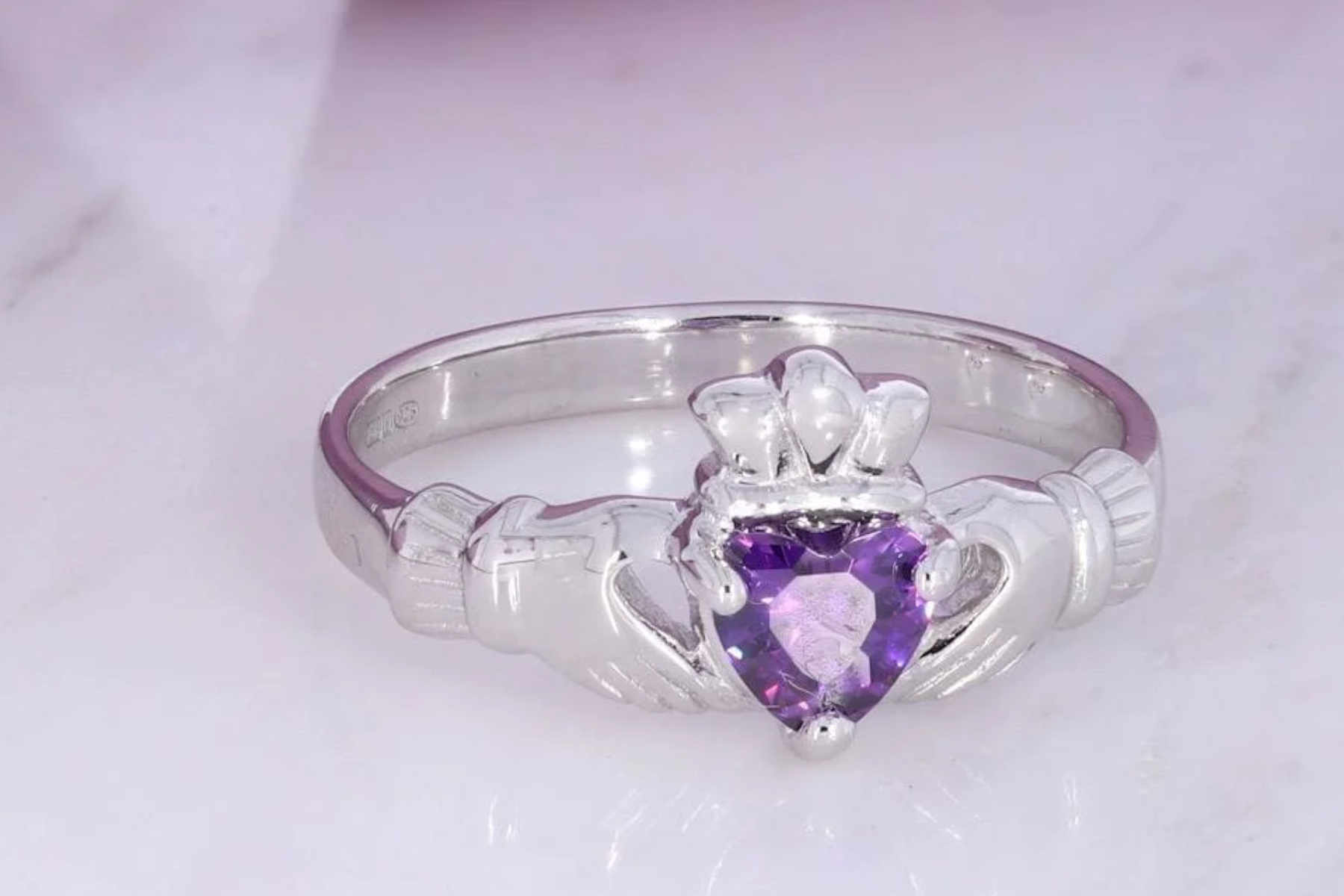 Claddagh ring with amethyst in the center