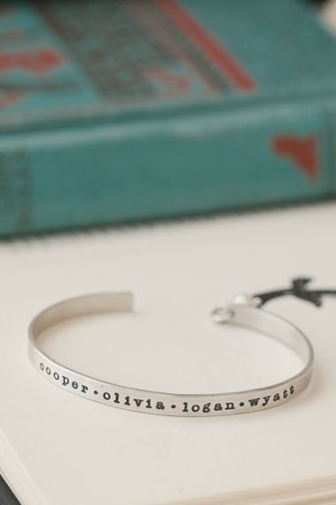 Lisa Leonard personalized silver cuff with 4 names of people on it