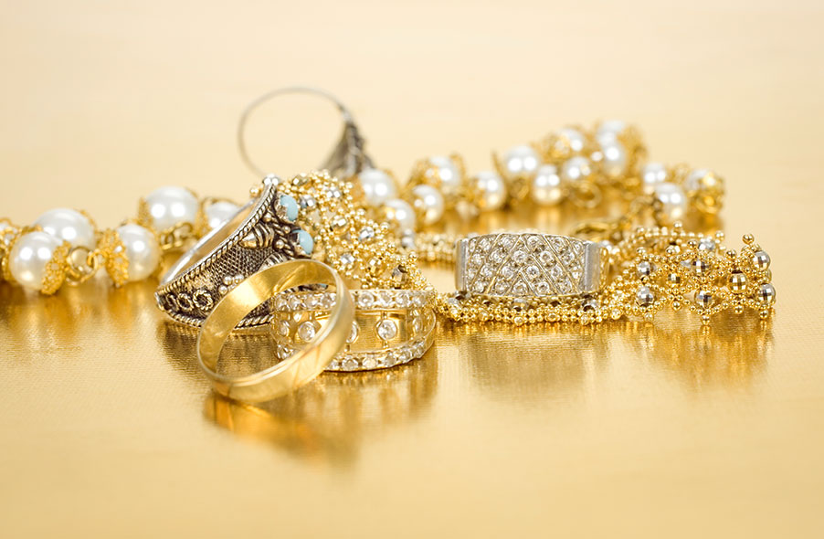 Different gold jewelries such as Earrings, bracelets and necklace