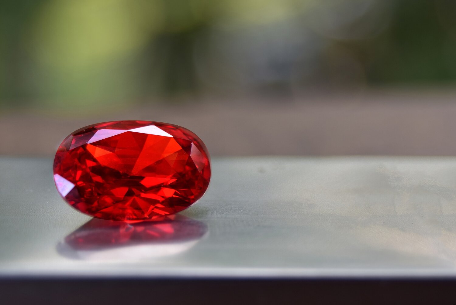 A smooth and polished ruby that is classified as a carbuncle gem