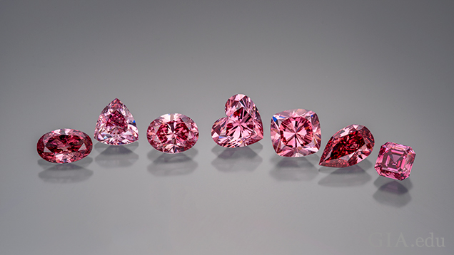 Seven lab-grown pink diamonds of different shape