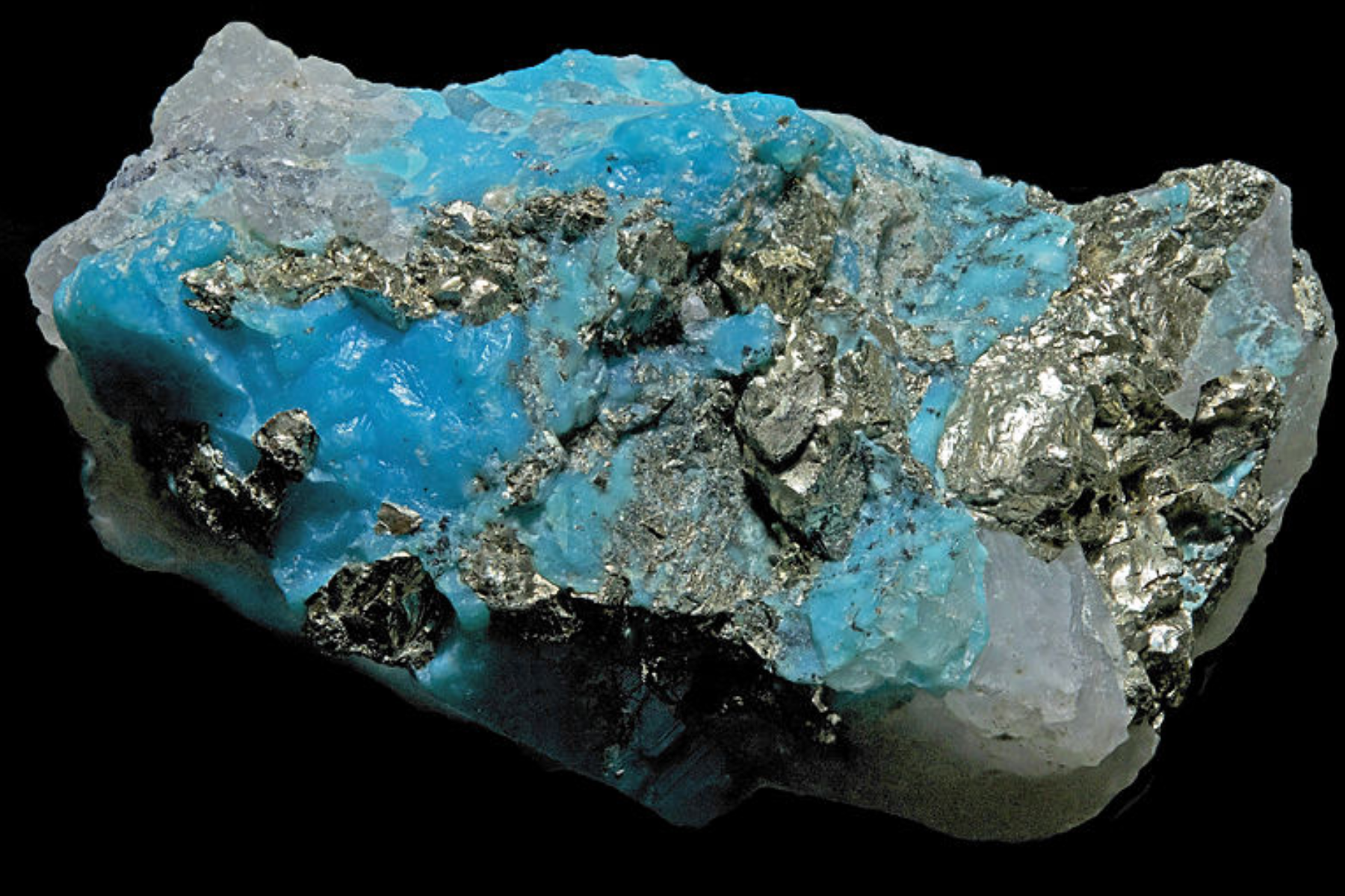 Turquoise still connected to its host rock