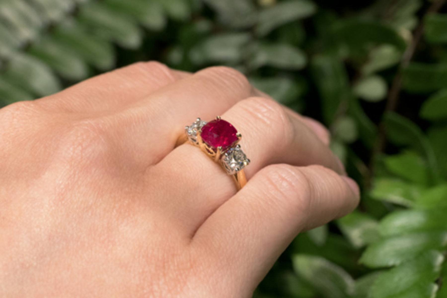 Ruby ring on woman's finger