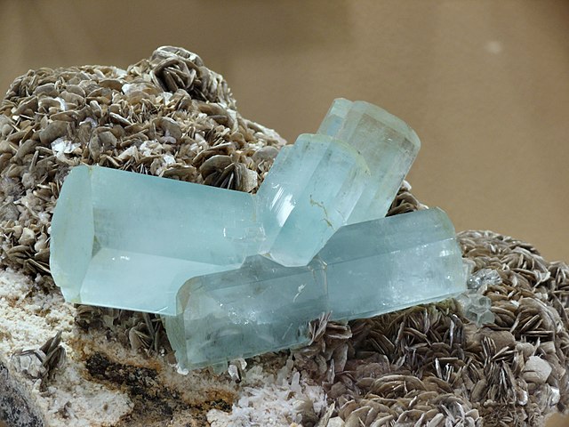 Aquamarine crystal on top of the rock