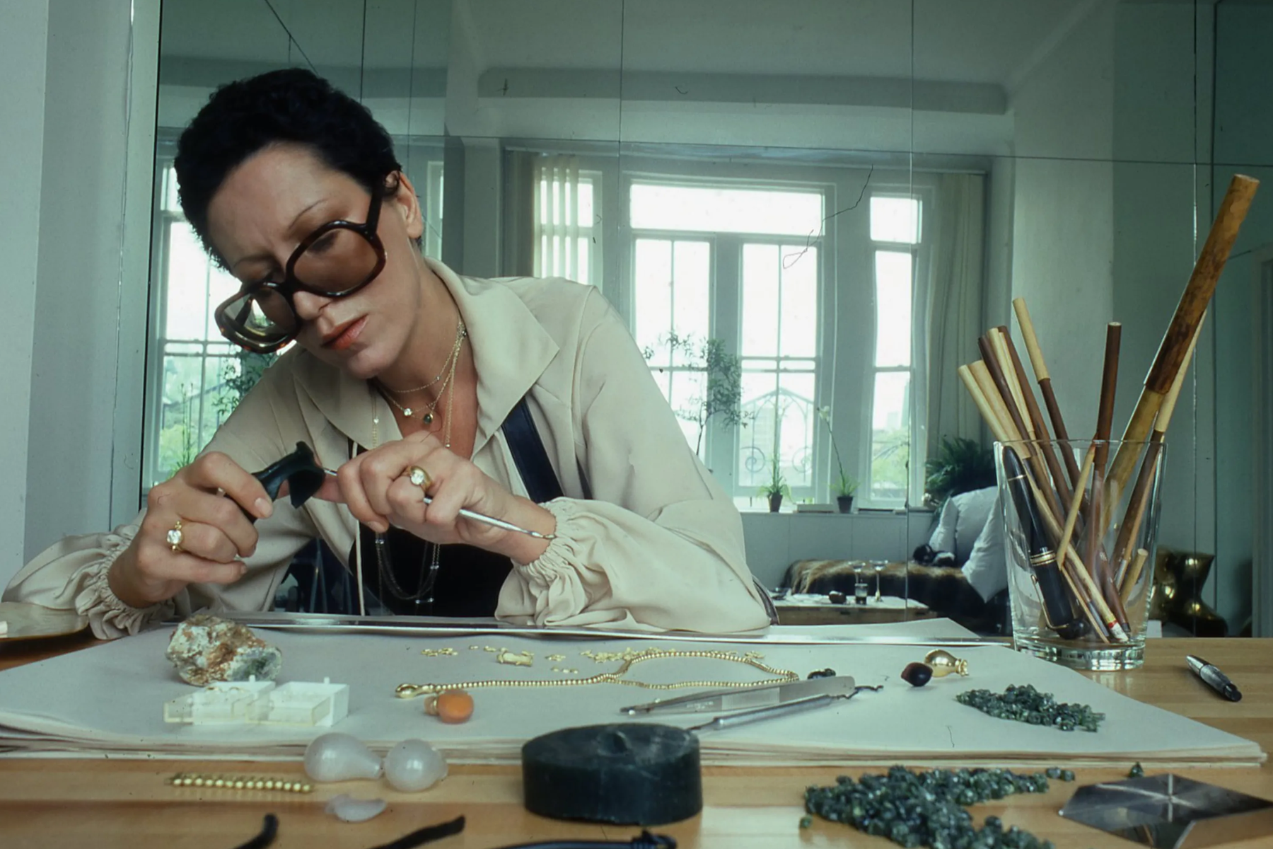 A woman vintage designer on her working table