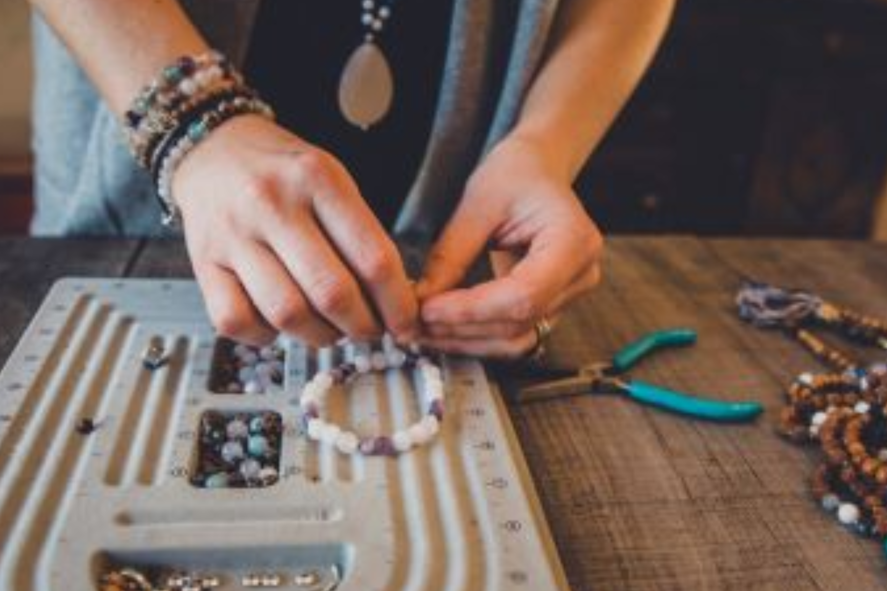 An artist who creates beaded bracelets