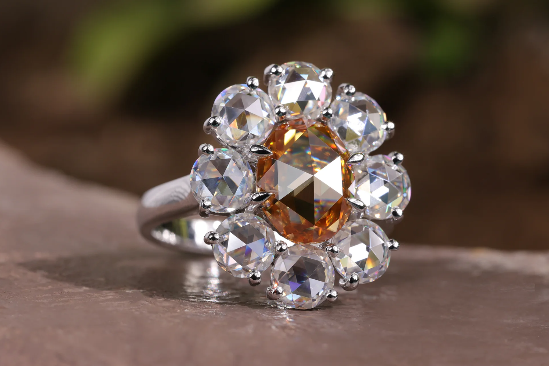 A ring with a flower made of stones