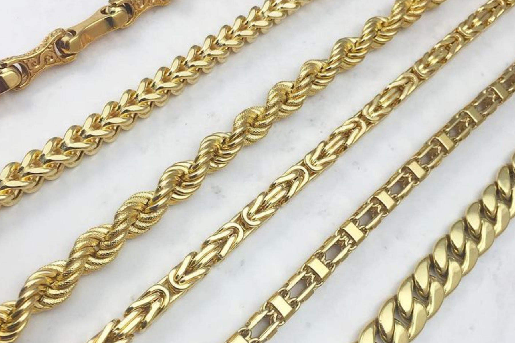 Six distinct gold necklace chains