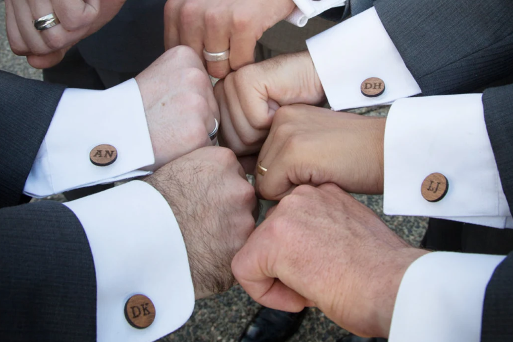 A group of men with cufflinks