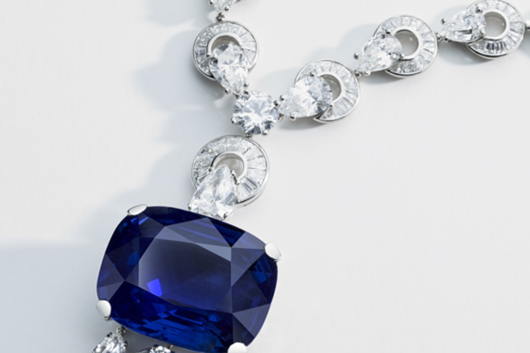 A close-up look of necklace with a rare 118 Ct. sapphire heads