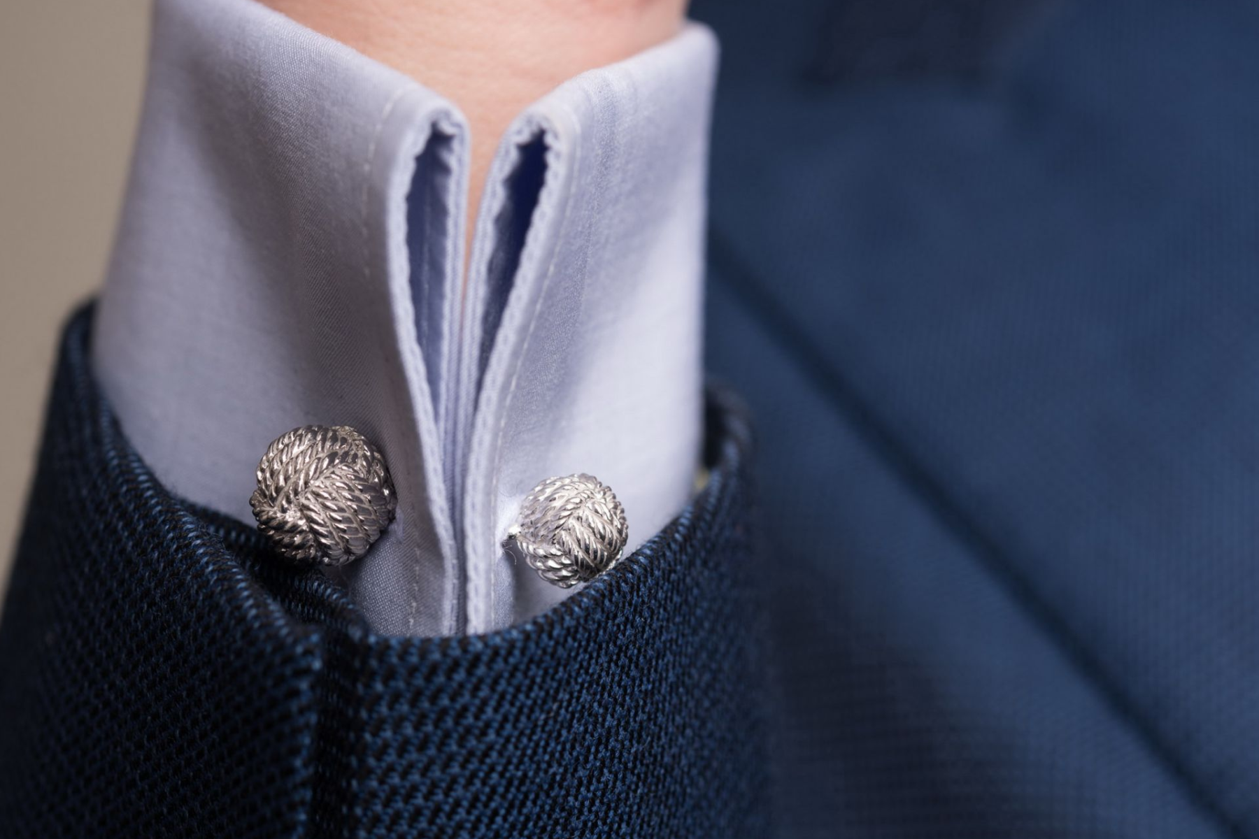 One of the groomsmen was wearing a suit with a platinum cufflink