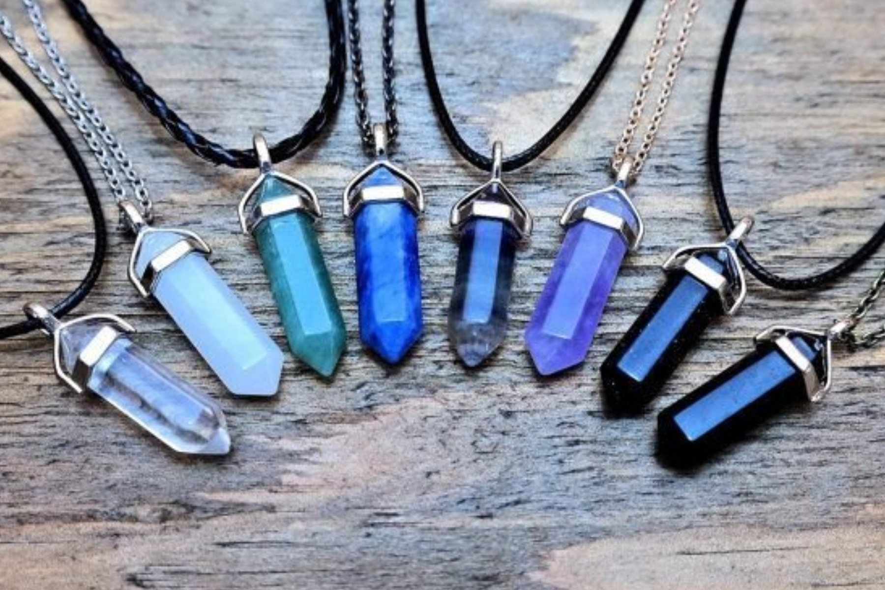 Blue crystal necklaces in eight different shades