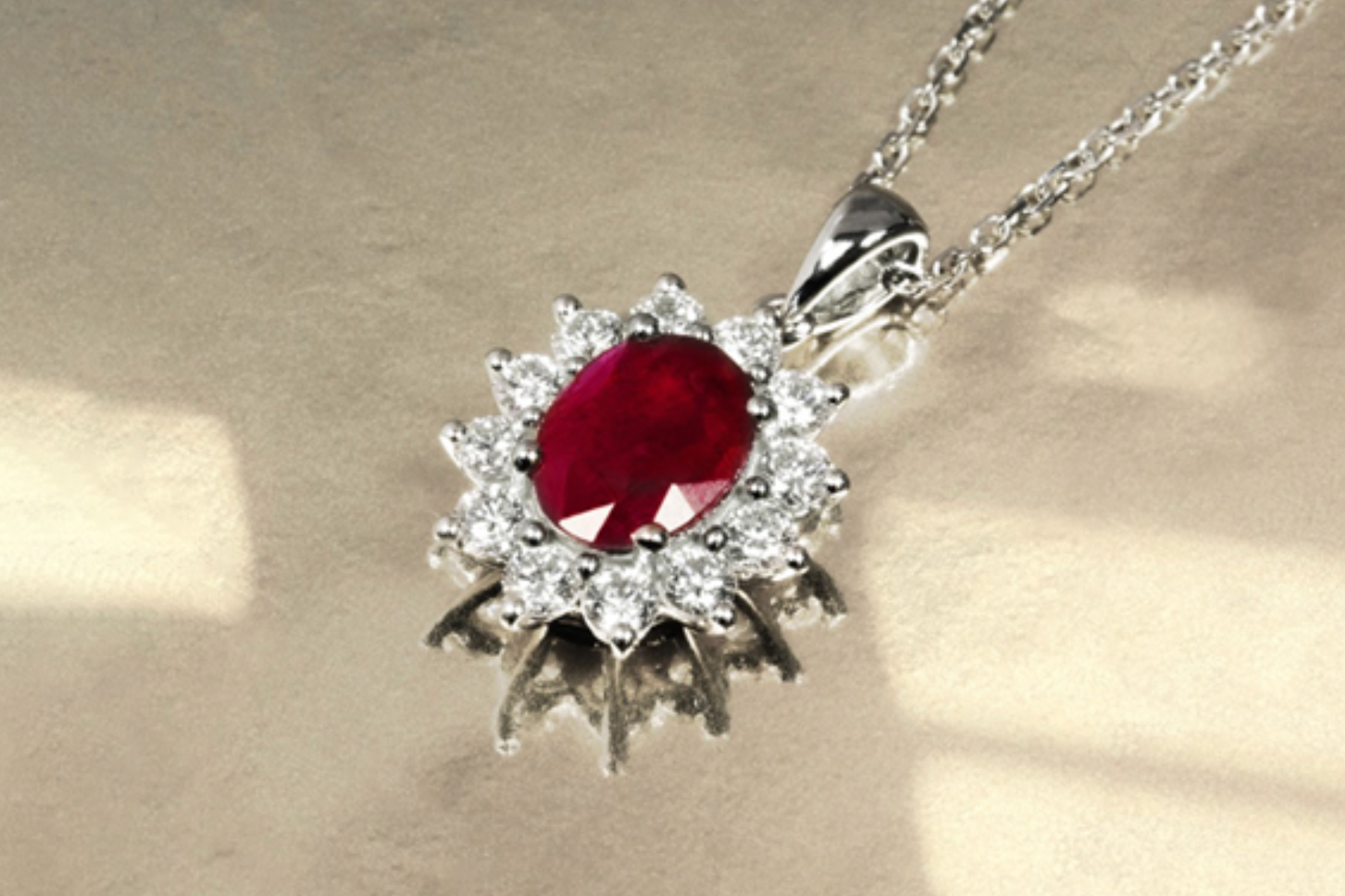A Ruby pendant on a silver lace