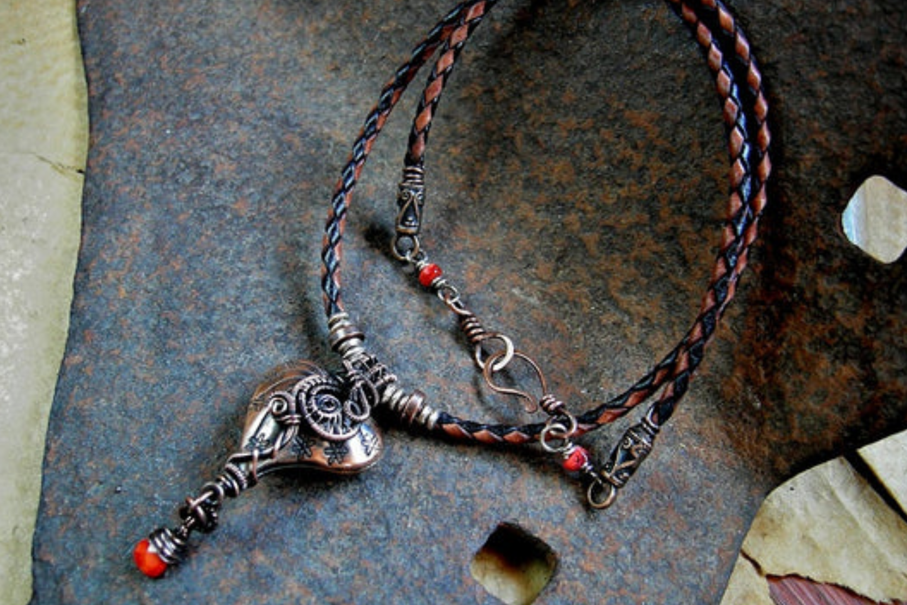 A love knot necklace on the solid rock floor