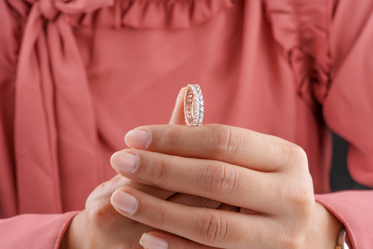 Diamond Ring held by a Person
