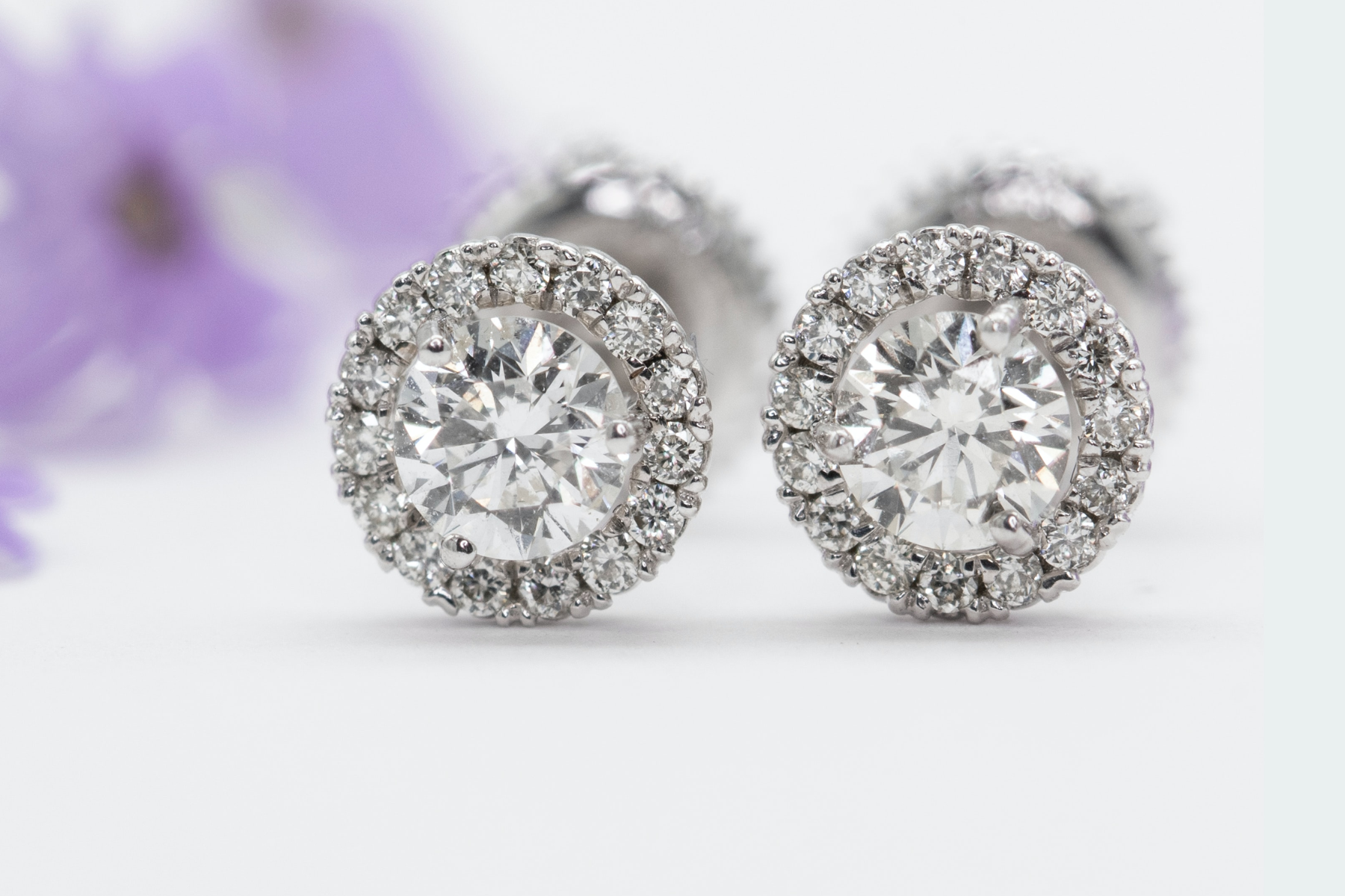 A pair of round platinum earrings