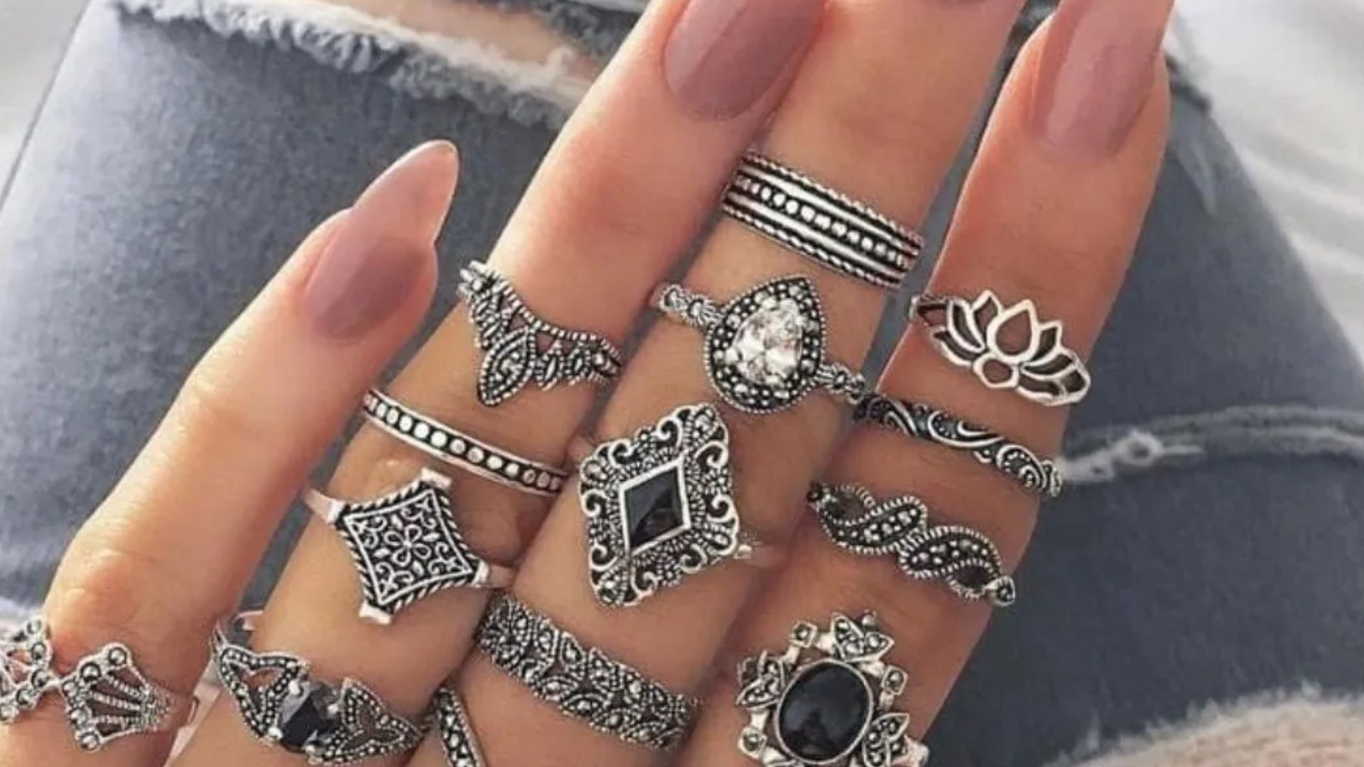 Person Wearing Too Many Rings On Hand