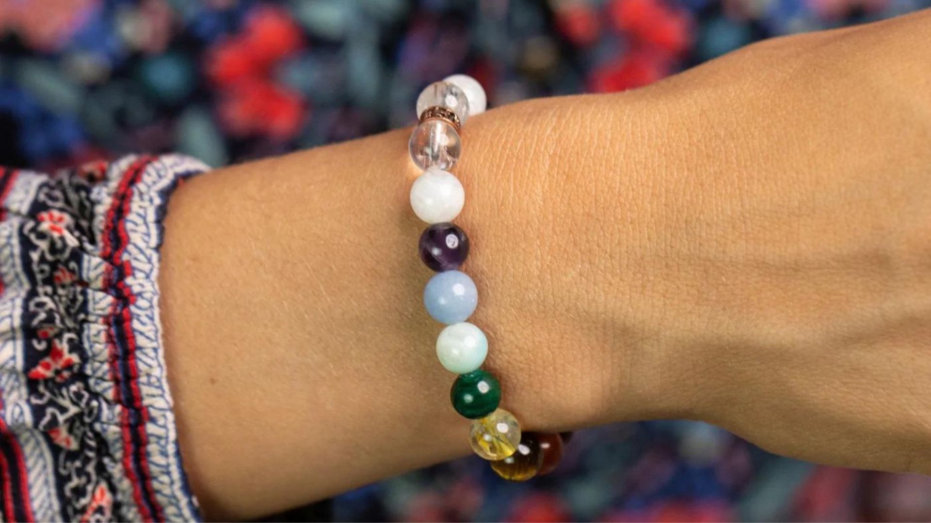 A Woman Wearing Bracelet With Multi Color Beads