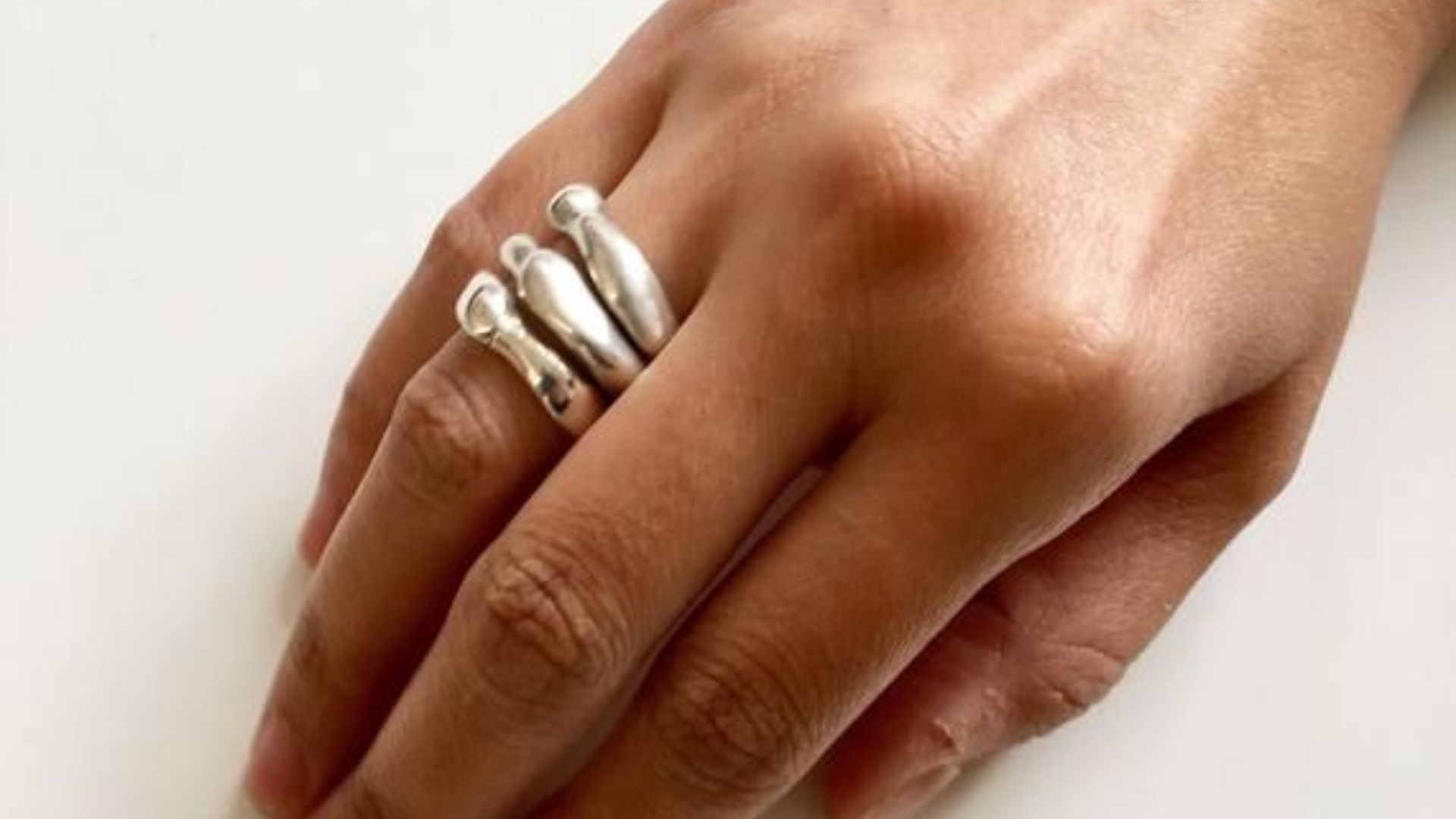 Dilver Ring On Person Hand