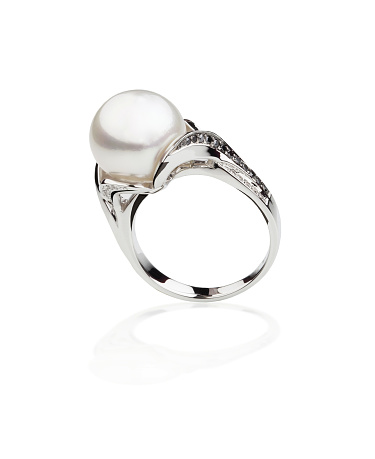 Silver jewel ring with round pearl on a white background