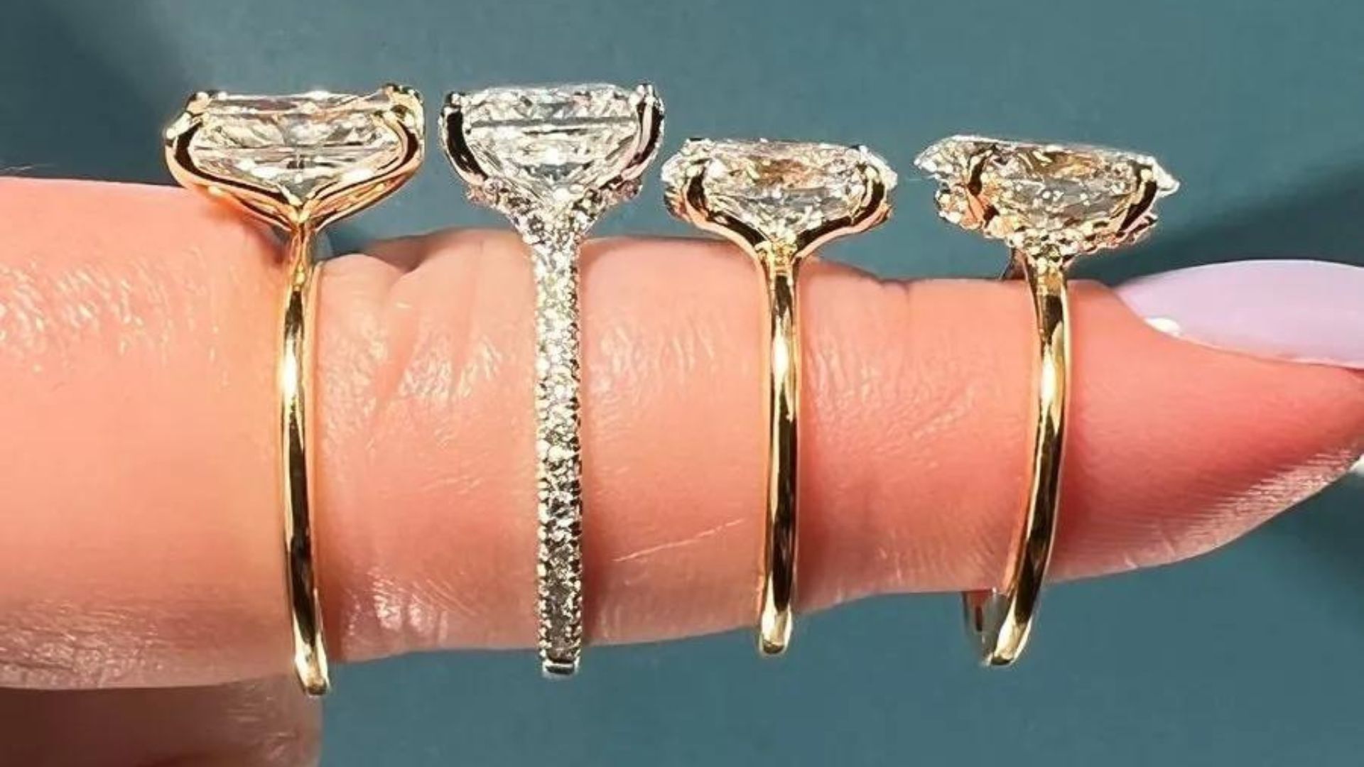 Four Different Size Of Ring In A Finger