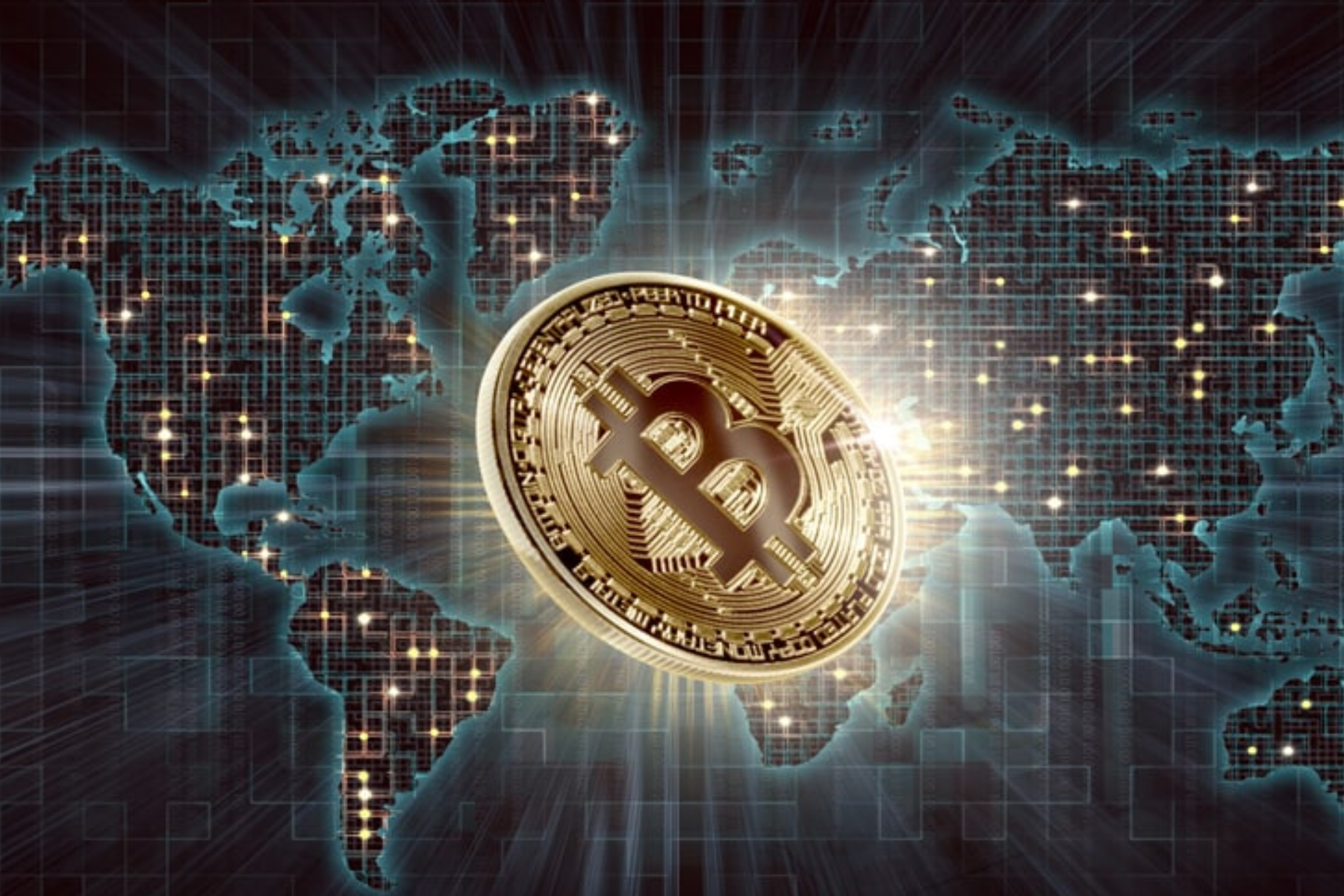 A close-up photograph of a shiny, golden Bitcoin is placed on top of a map background