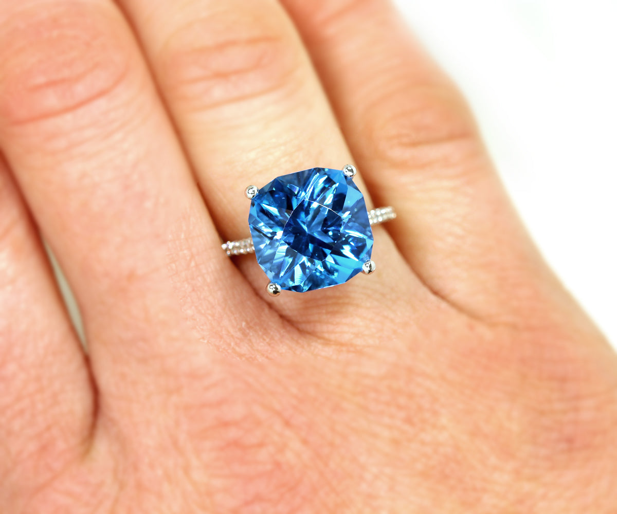 A Woman Wearing Stunning Swiss Blue Topaz Ring