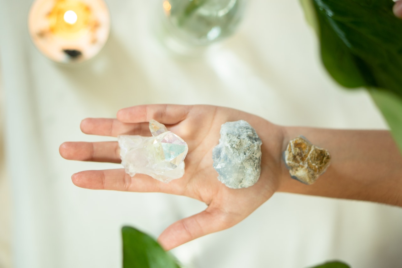 Crystal Stones on a Person's Hand